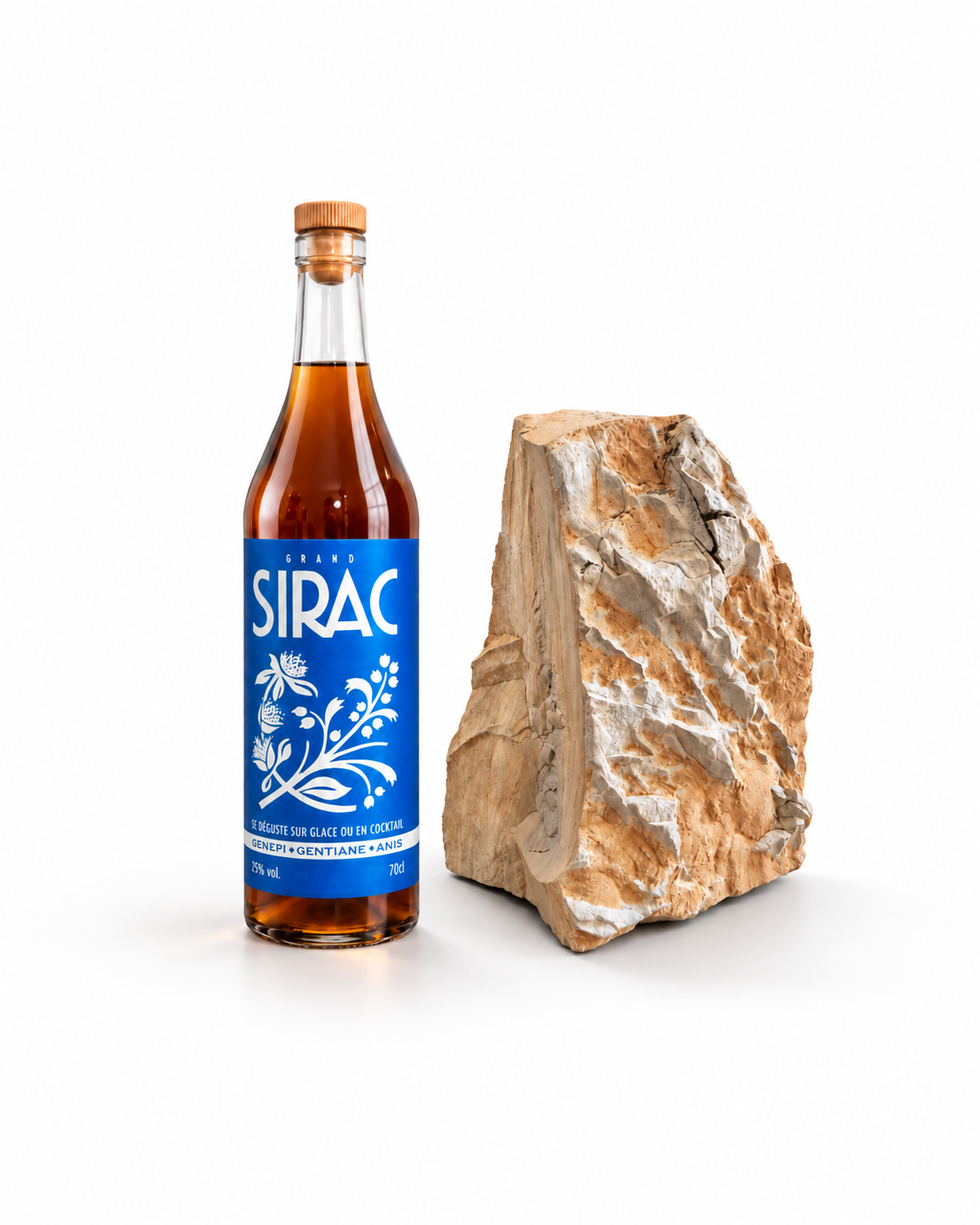 Bouteille Grand Sirac accompagnée d’une roche des Hautes-Alpes